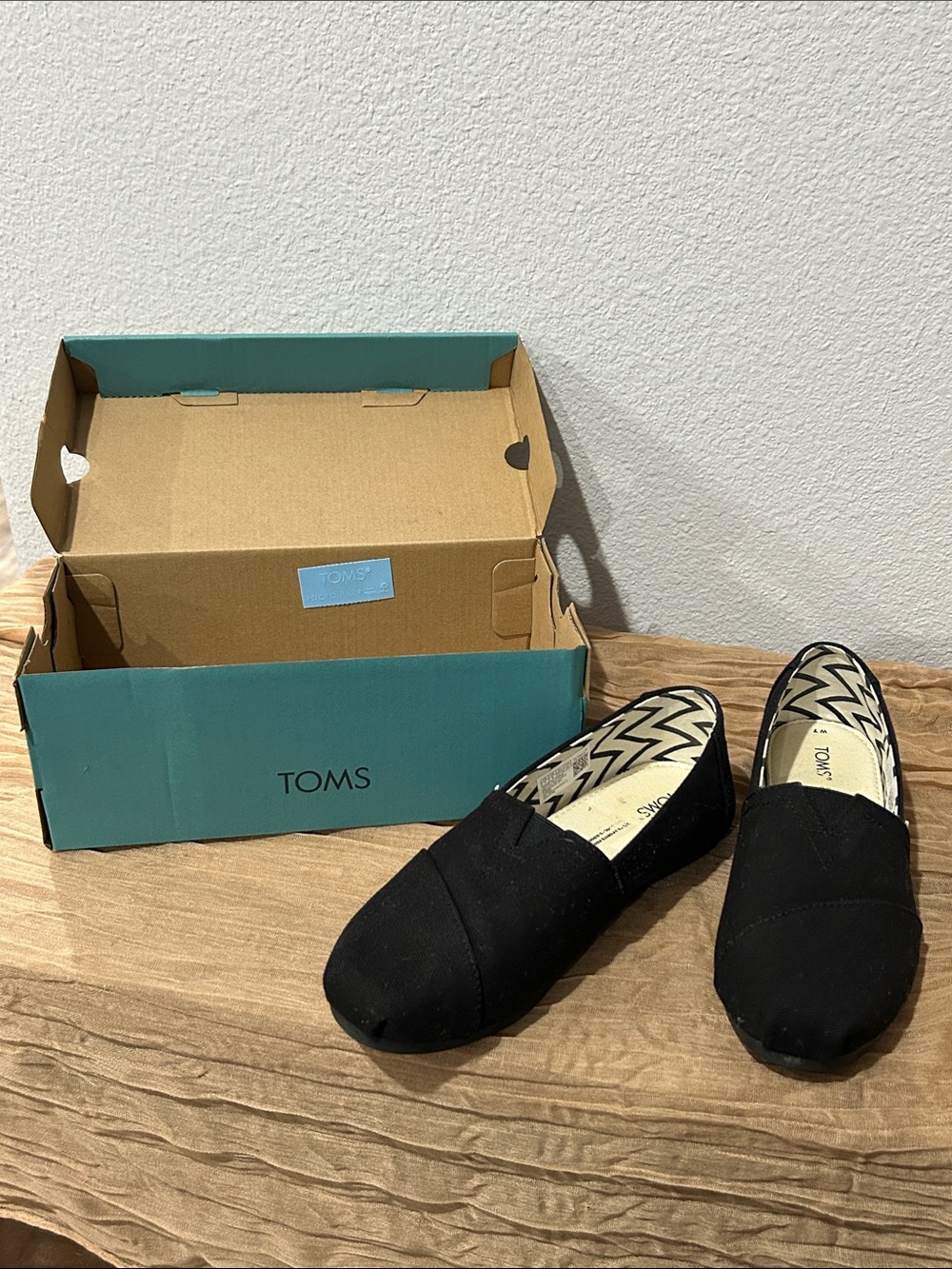Black slip on Toms